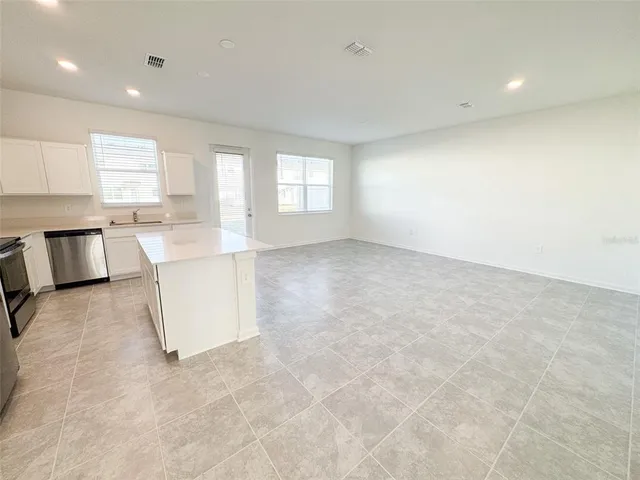 a view of a kitchen with a sink