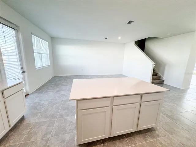 a view of a room with a window