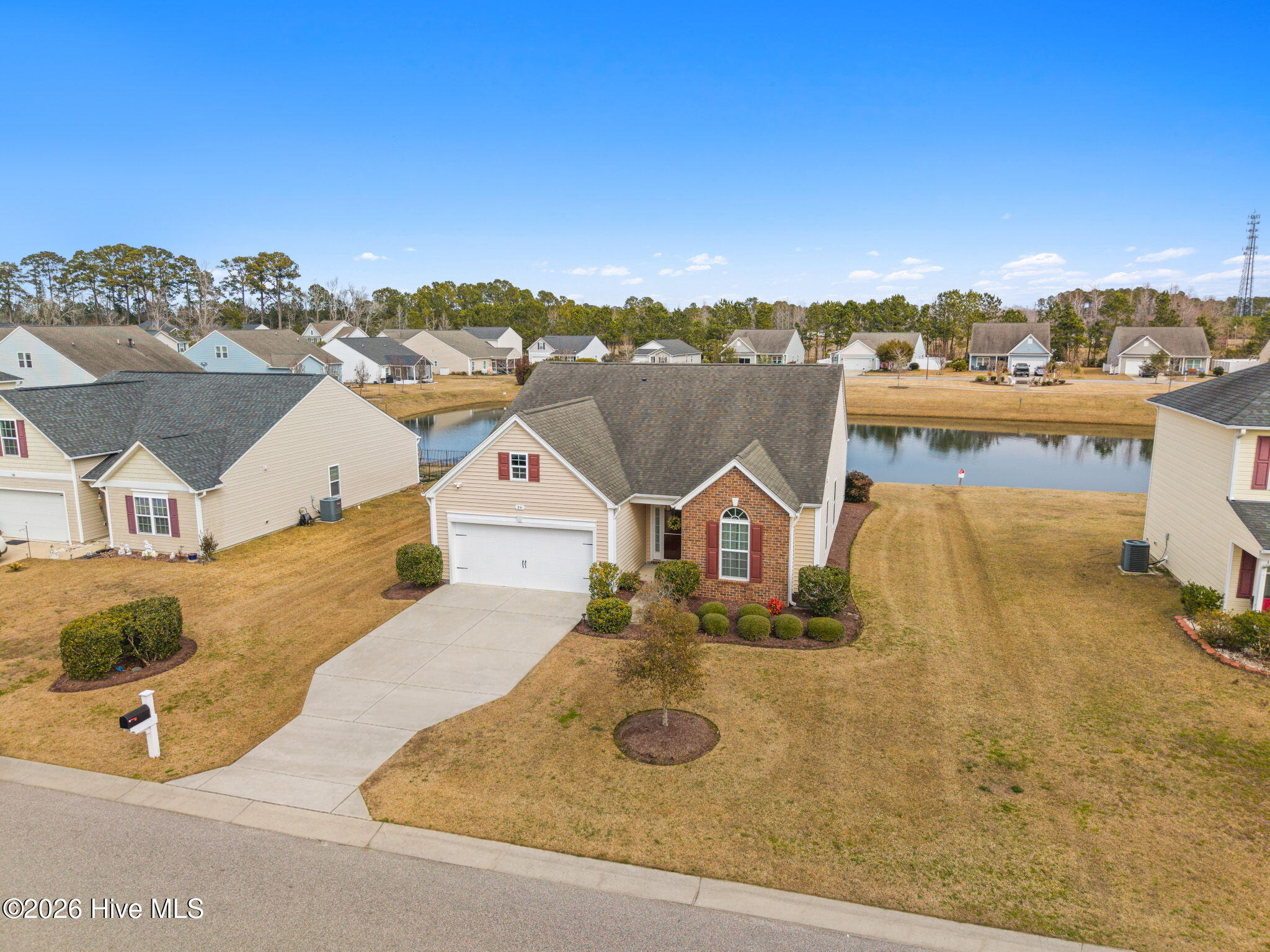 34 Lighthouse Cove Loop, Unit 113 Calabash, NC 28467 - Photo 3 of 47 4-web-or-mls-DJI_20260208114731_0343_D