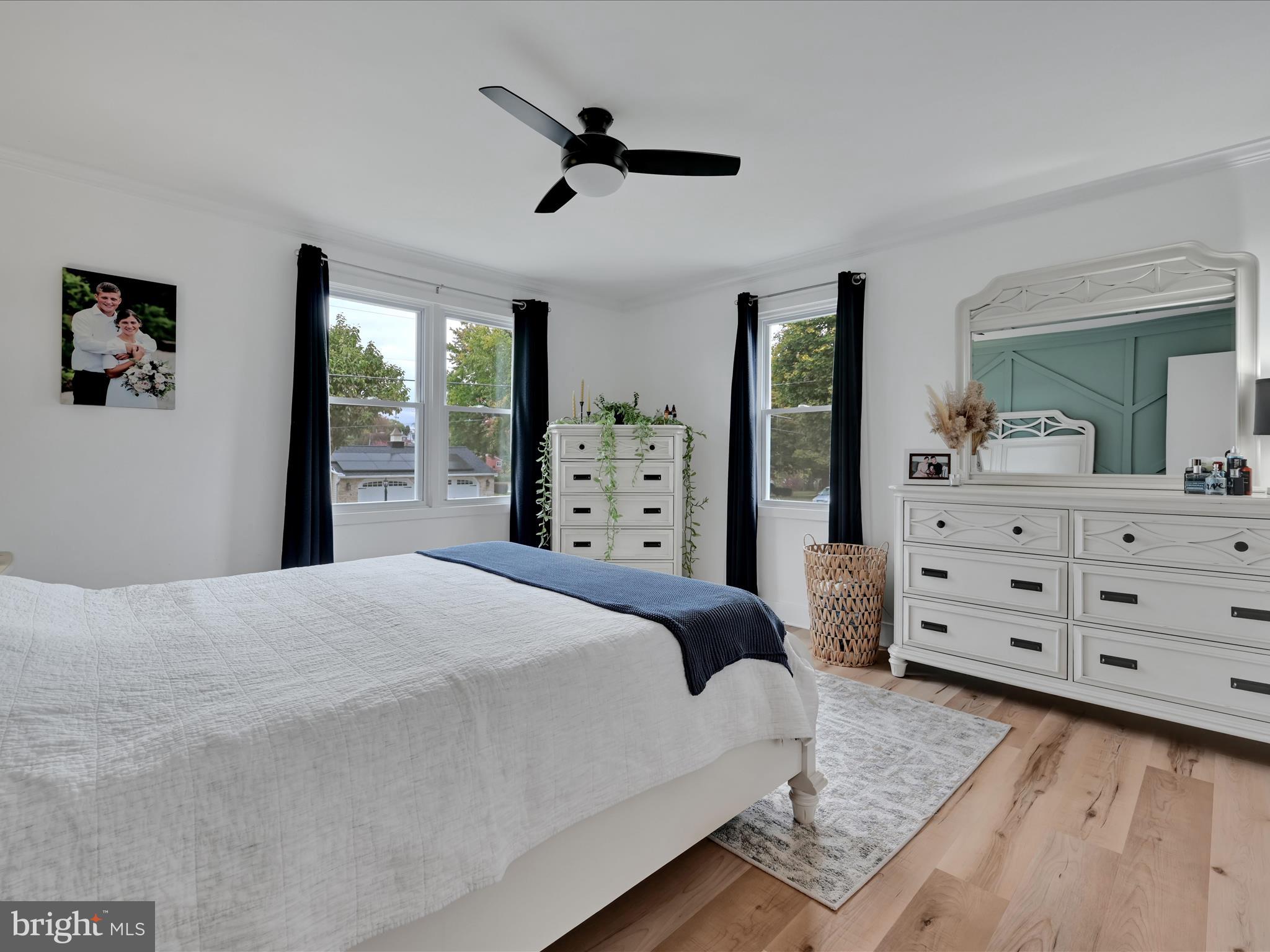 320 Elm Street Lebanon, PA 17042 - Photo 18 of 44 a bedroom with a bed and a dresser
