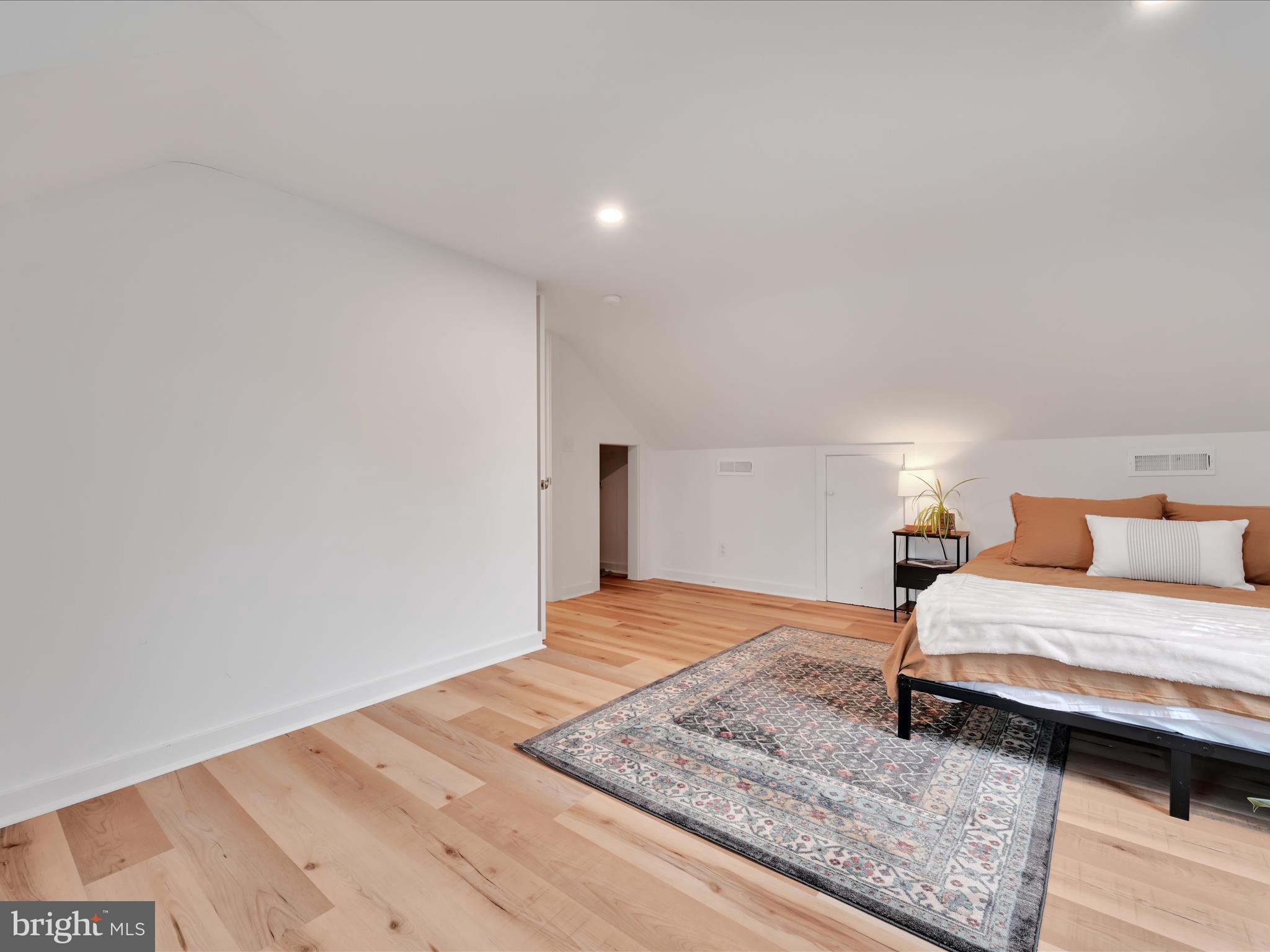 320 Elm Street Lebanon, PA 17042 - Photo 22 of 44 a bedroom with a bed and wooden floor