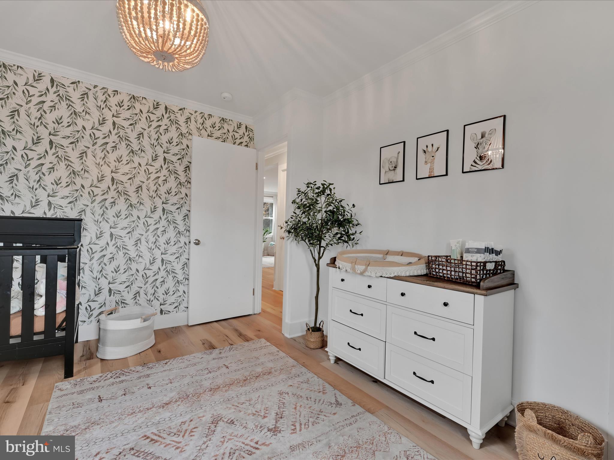 320 Elm Street Lebanon, PA 17042 - Photo 25 of 44 a room with a dresser and a chandelier