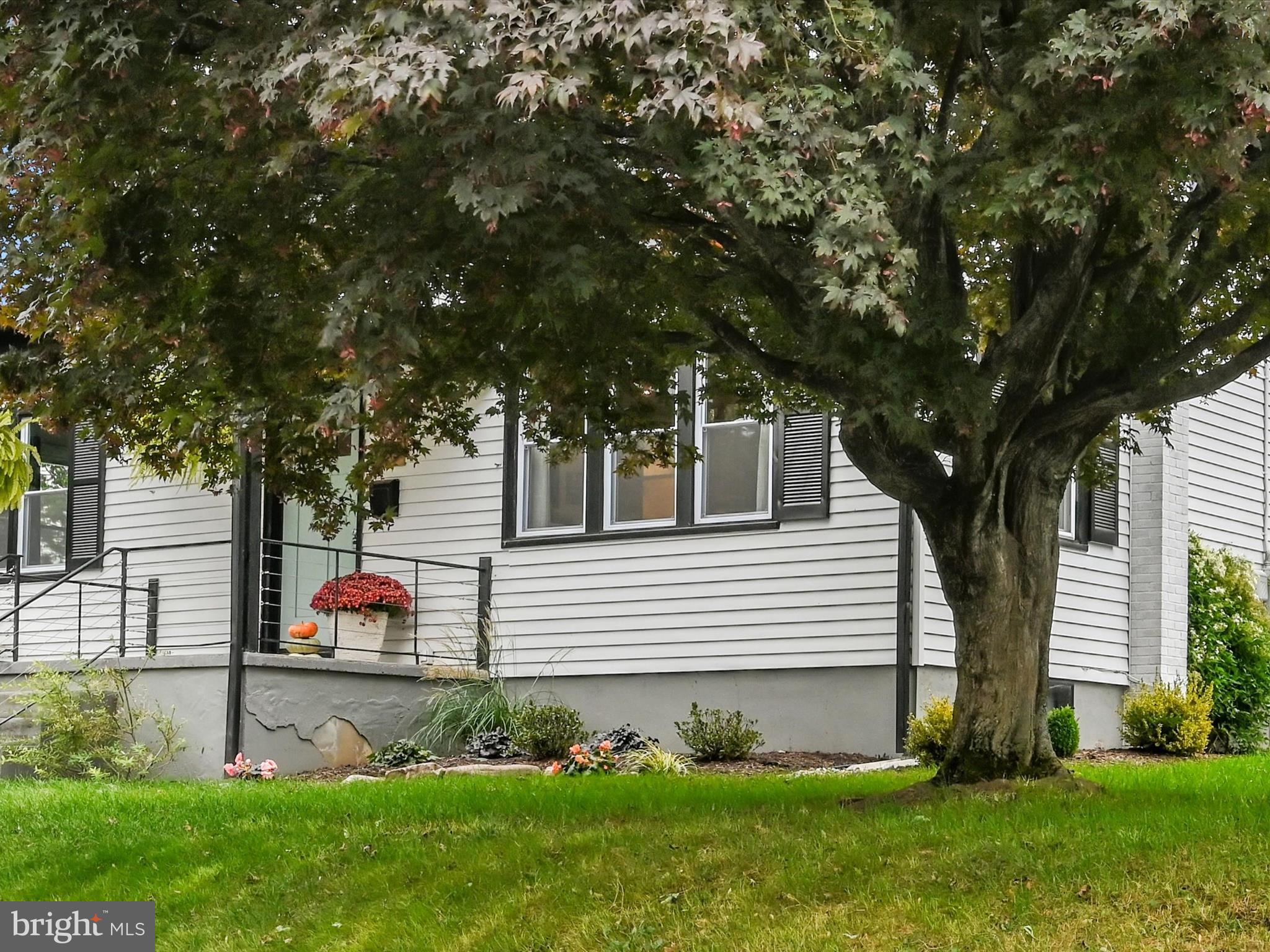 320 Elm Street Lebanon, PA 17042 - Photo 4 of 44 a front view of a house with garden