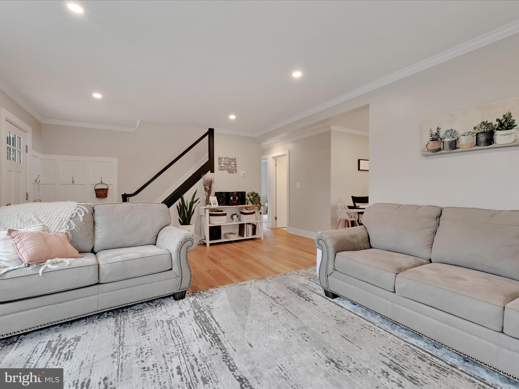 320 Elm Street Lebanon, PA 17042 - Photo 9 of 44 a living room with furniture and stairs