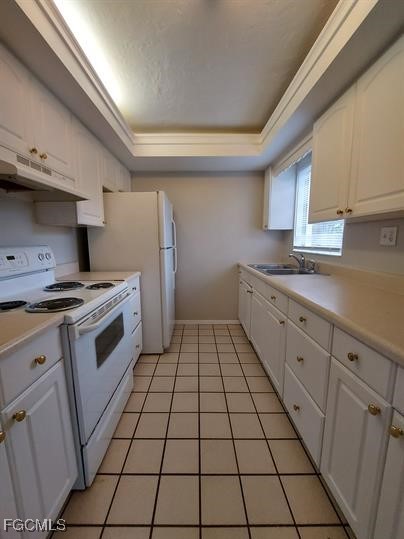 13208 Fourth Street Fort Myers, FL 33905 - Photo 7 of 27 a kitchen with stainless steel appliances a sink stove and cabinets