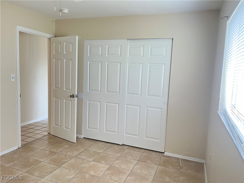 13208 Fourth Street Fort Myers, FL 33905 - Photo 9 of 27 an empty room with windows