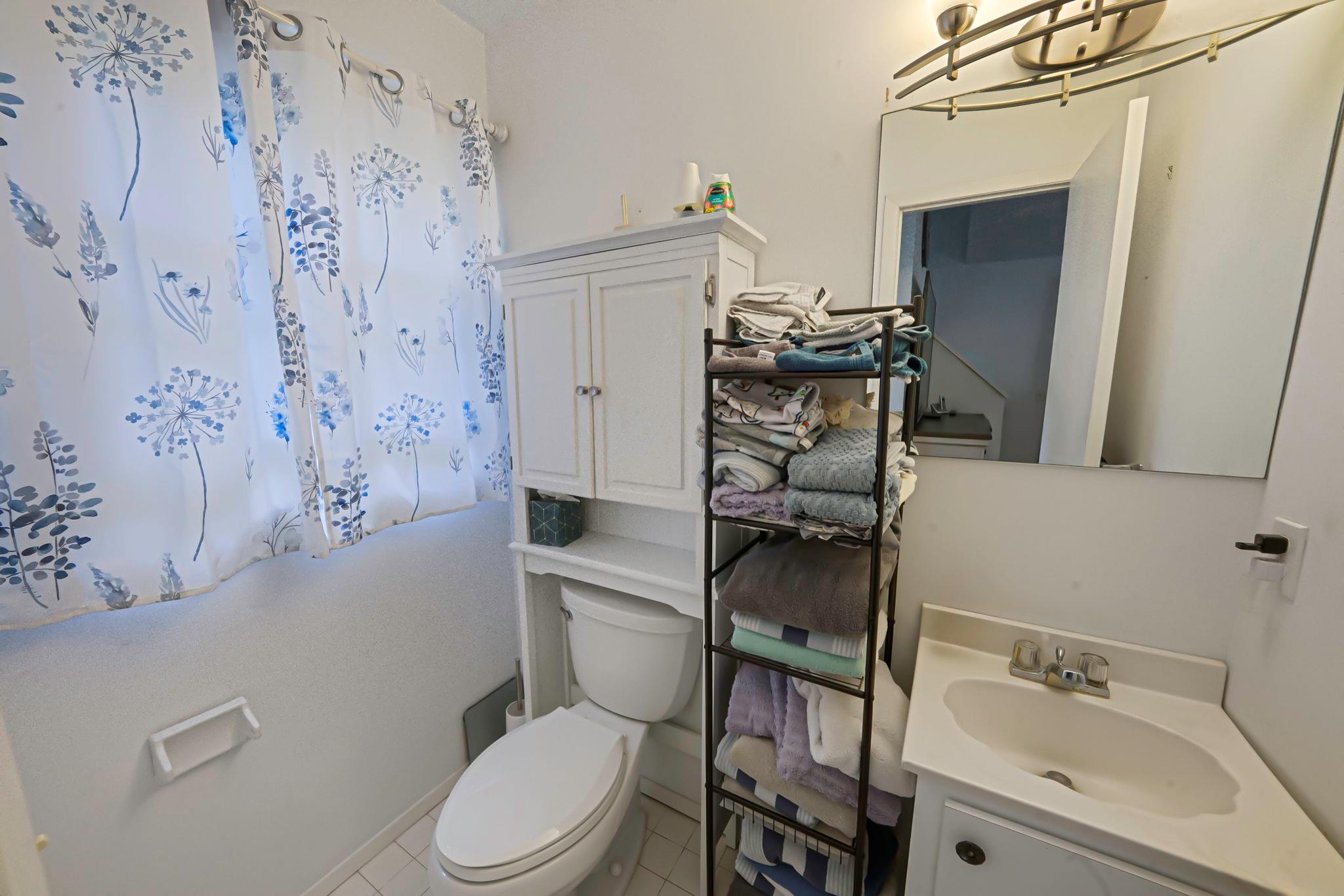 28 Huntting Road East Hampton, NY 11937 - Photo 6 of 14 Bathroom featuring toilet, vanity, and tile patterned flooring