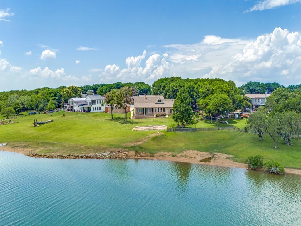 5975 Diamond Spur Frisco, TX 75036 - Photo 6 of 40 a view of a lake with houses in the background