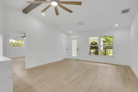 an empty room with windows