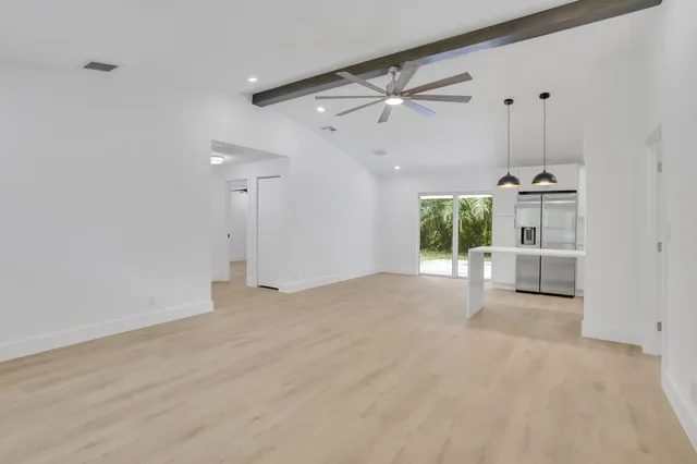 a view of a livingroom with a staircase