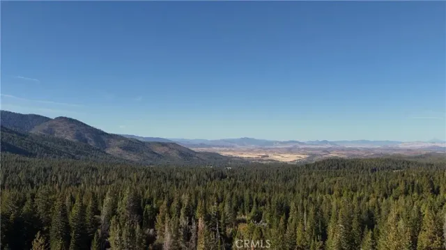 a view of mountain with sunset