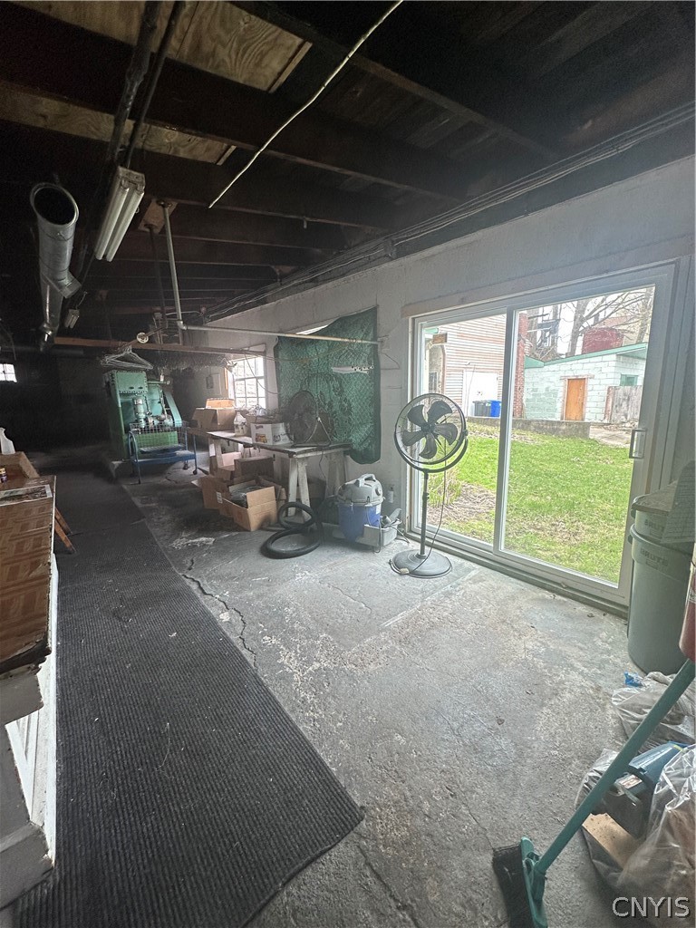 312 Seneca Street Fulton, NY 13069 - Photo 14 of 22 Dowstairs backroom with walk out