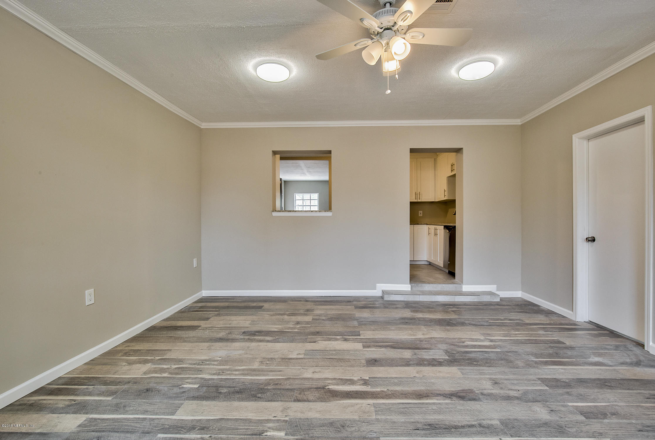 2846 Kline Road Jacksonville, FL 32246 - Photo 20 of 51 a view of an empty room with a window