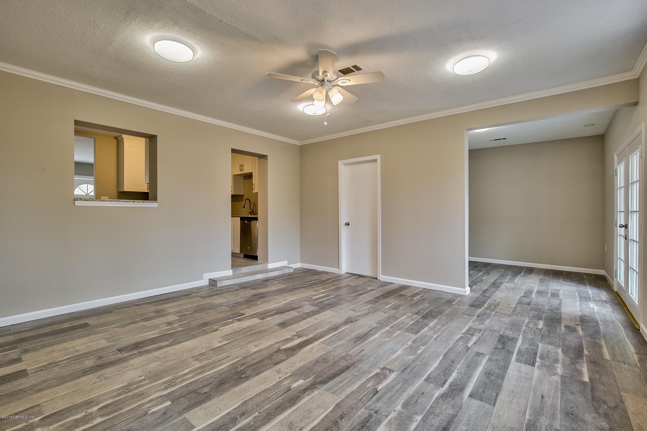 2846 Kline Road Jacksonville, FL 32246 - Photo 21 of 51 a view of a livingroom with a ceiling fan