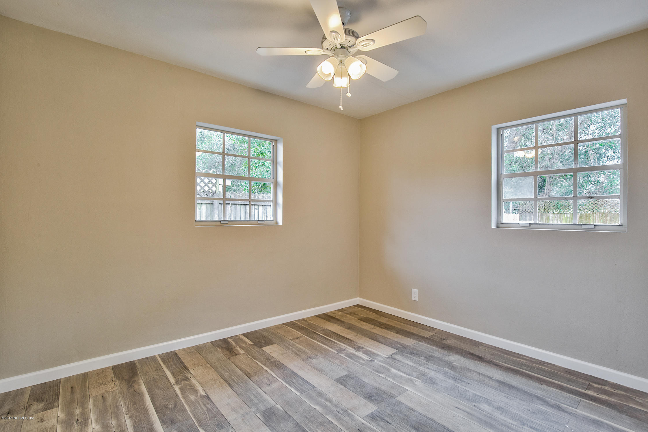2846 Kline Road Jacksonville, FL 32246 - Photo 40 of 51 an empty room with a window