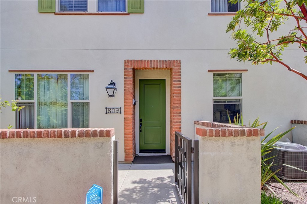 809 El Paseo Lake Forest, CA 92610 - Photo 2 of 45 a front view of a house with a porch