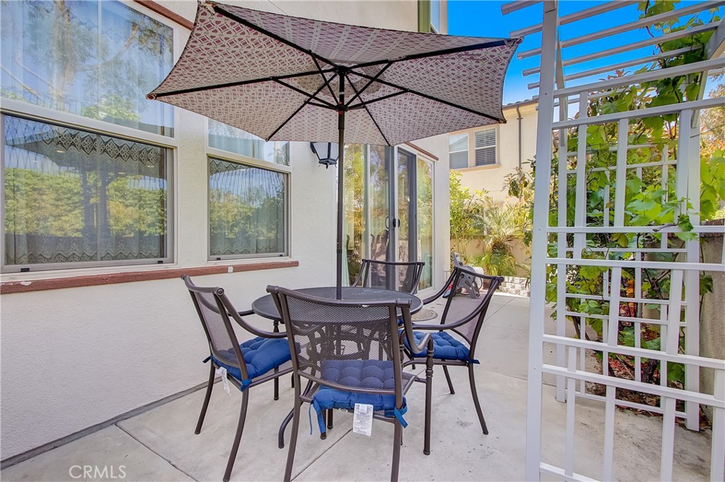 809 El Paseo Lake Forest, CA 92610 - Photo 29 of 45 a view of a dining room with furniture and chandelier