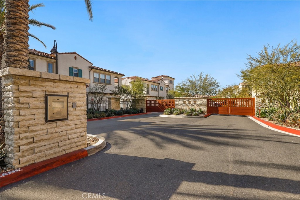 809 El Paseo Lake Forest, CA 92610 - Photo 36 of 45 a view of a brick building next to a road