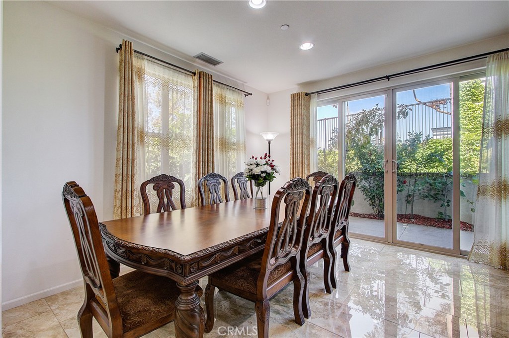 809 El Paseo Lake Forest, CA 92610 - Photo 6 of 45 a view of a dining room with furniture and window