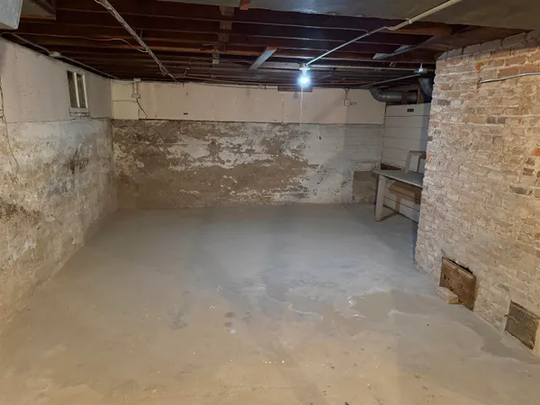 a bathroom with a sink a mirror and a shower