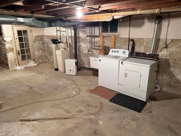 a view of a yard covered in snow