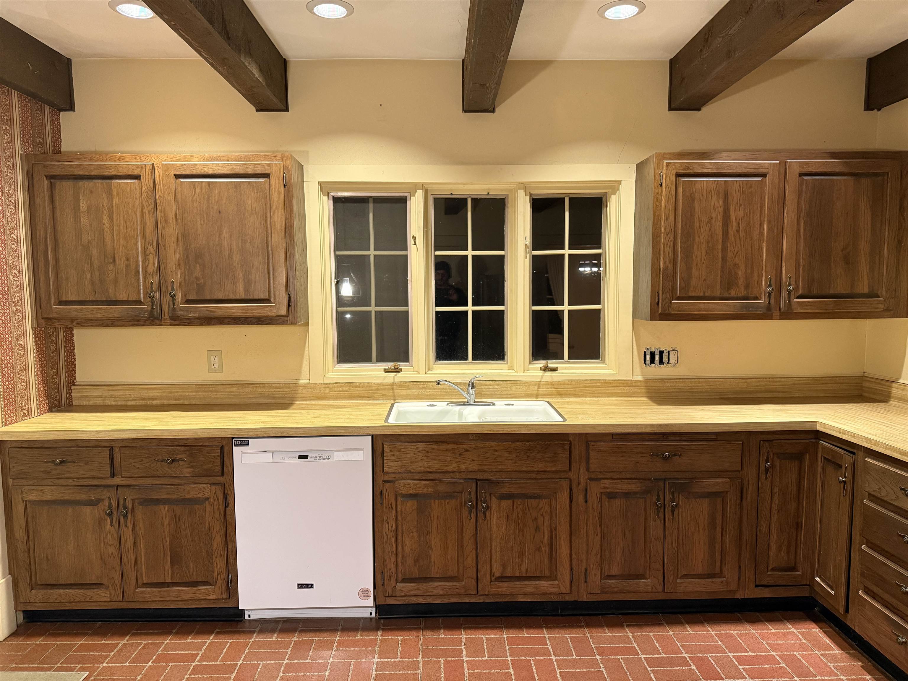 1629 West Harrison Street Freeport, IL 61032 - Photo 2 of 36 a kitchen with a sink and cabinets
