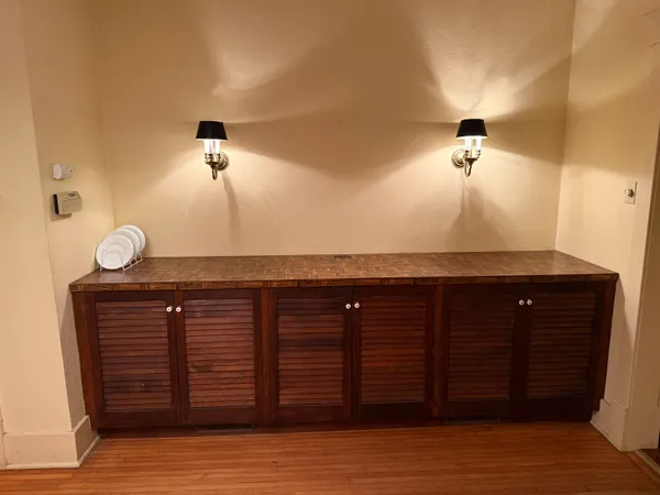 an empty room with a mirror