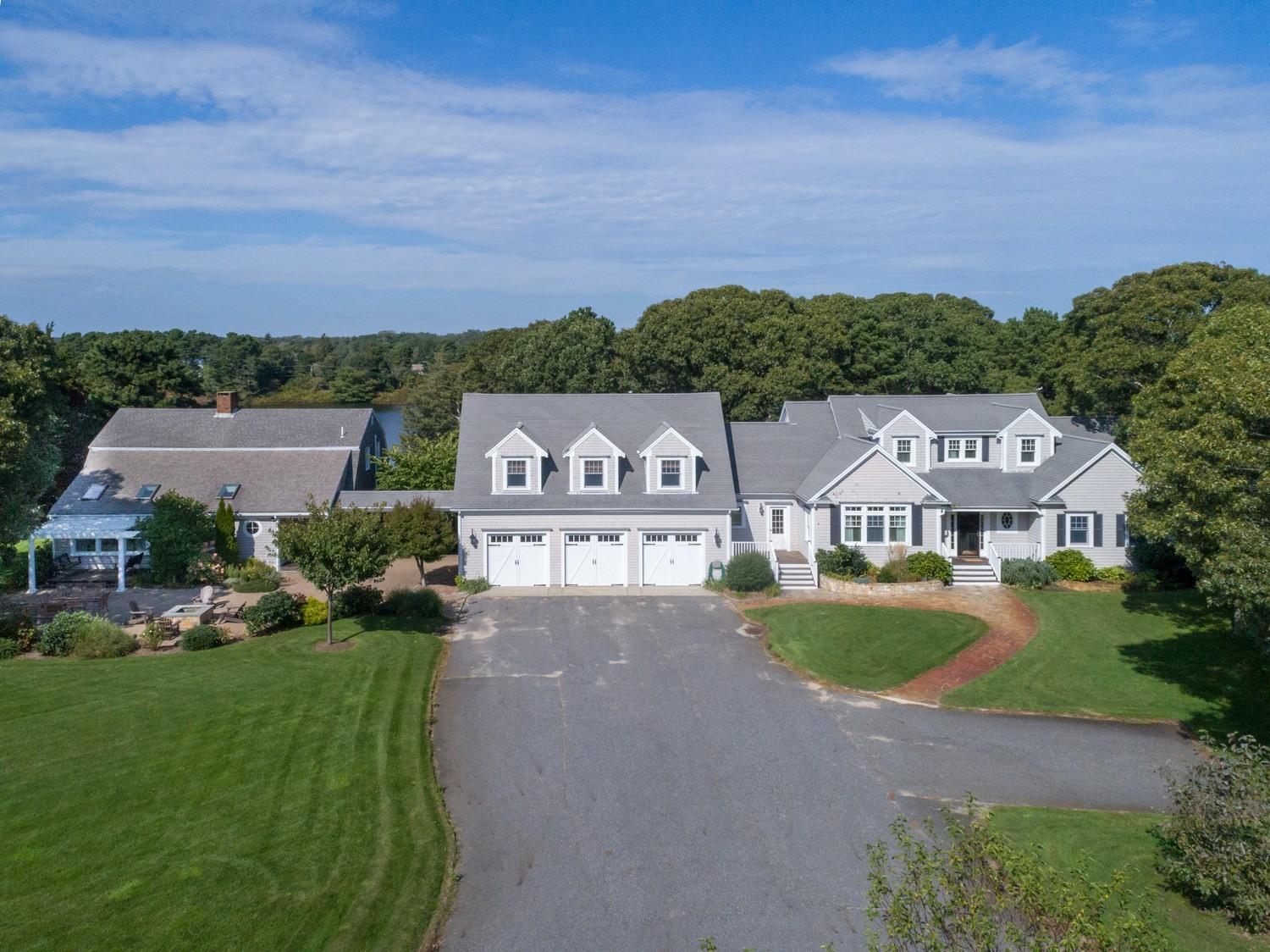 an aerial view of a house with a garden