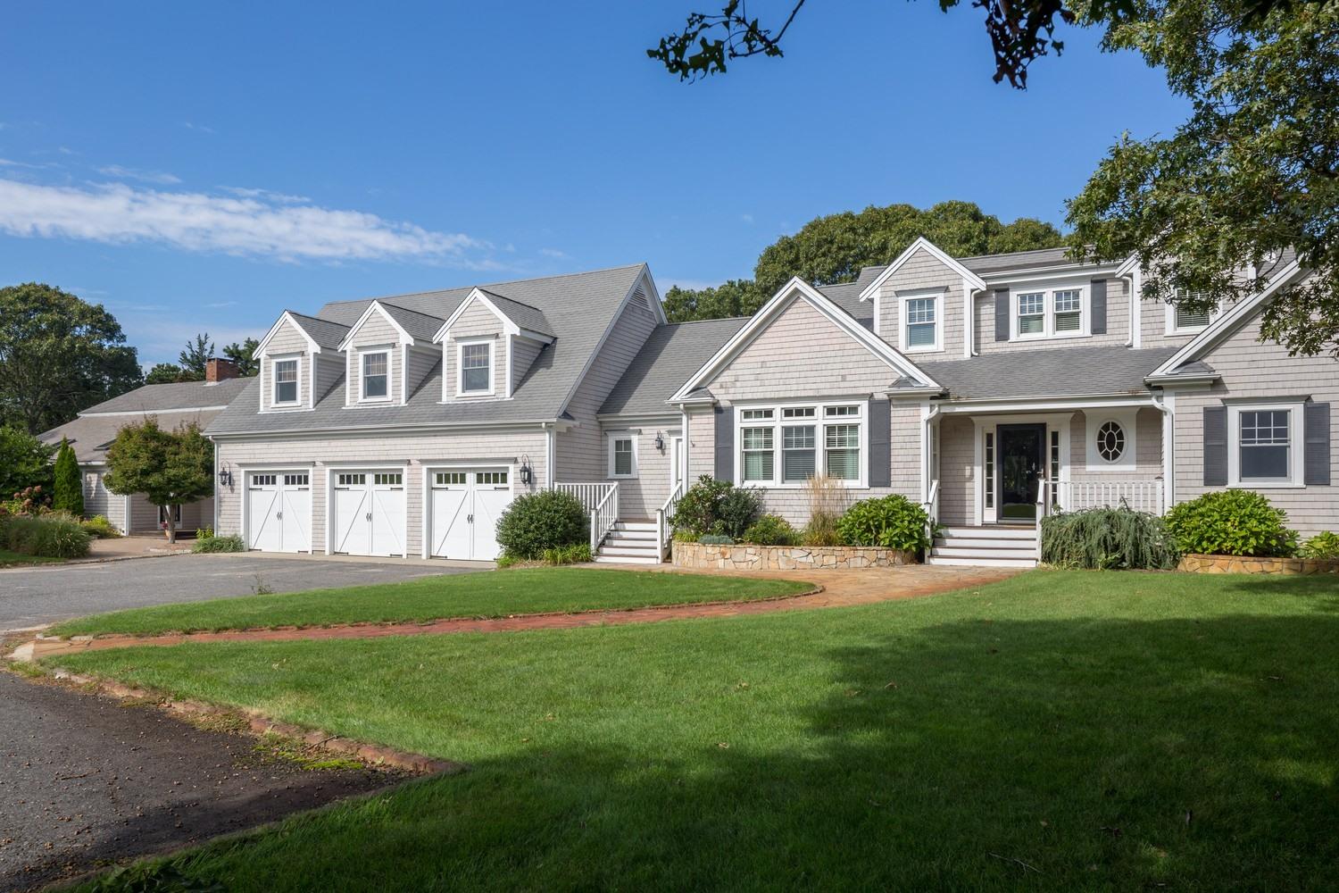 721 Samoset Road Eastham, MA 02642 - Photo 16 of 32 a front view of a house with a garden