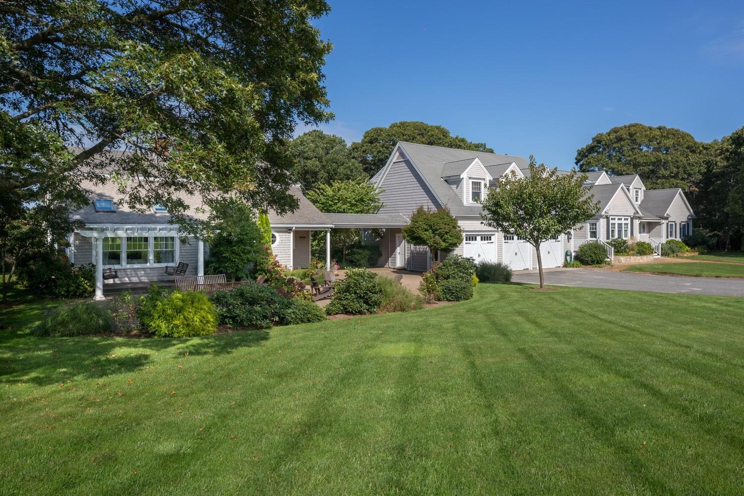 721 Samoset Road Eastham, MA 02642 - Photo 20 of 32 a front view of a house with a yard