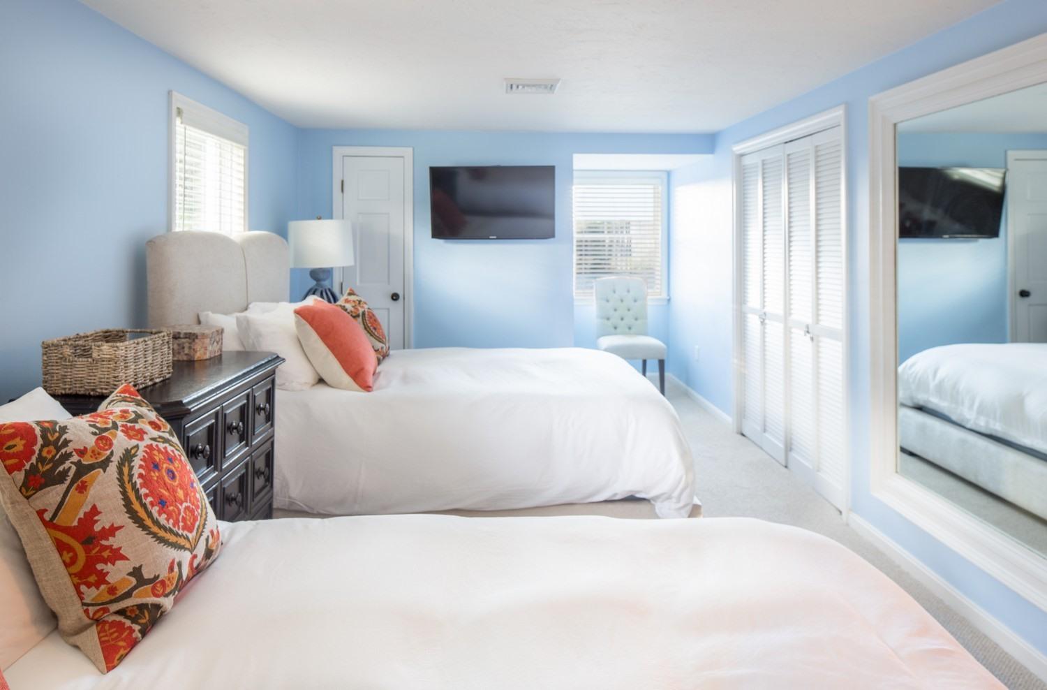 721 Samoset Road Eastham, MA 02642 - Photo 28 of 32 a bedroom with a bed and flat screen tv