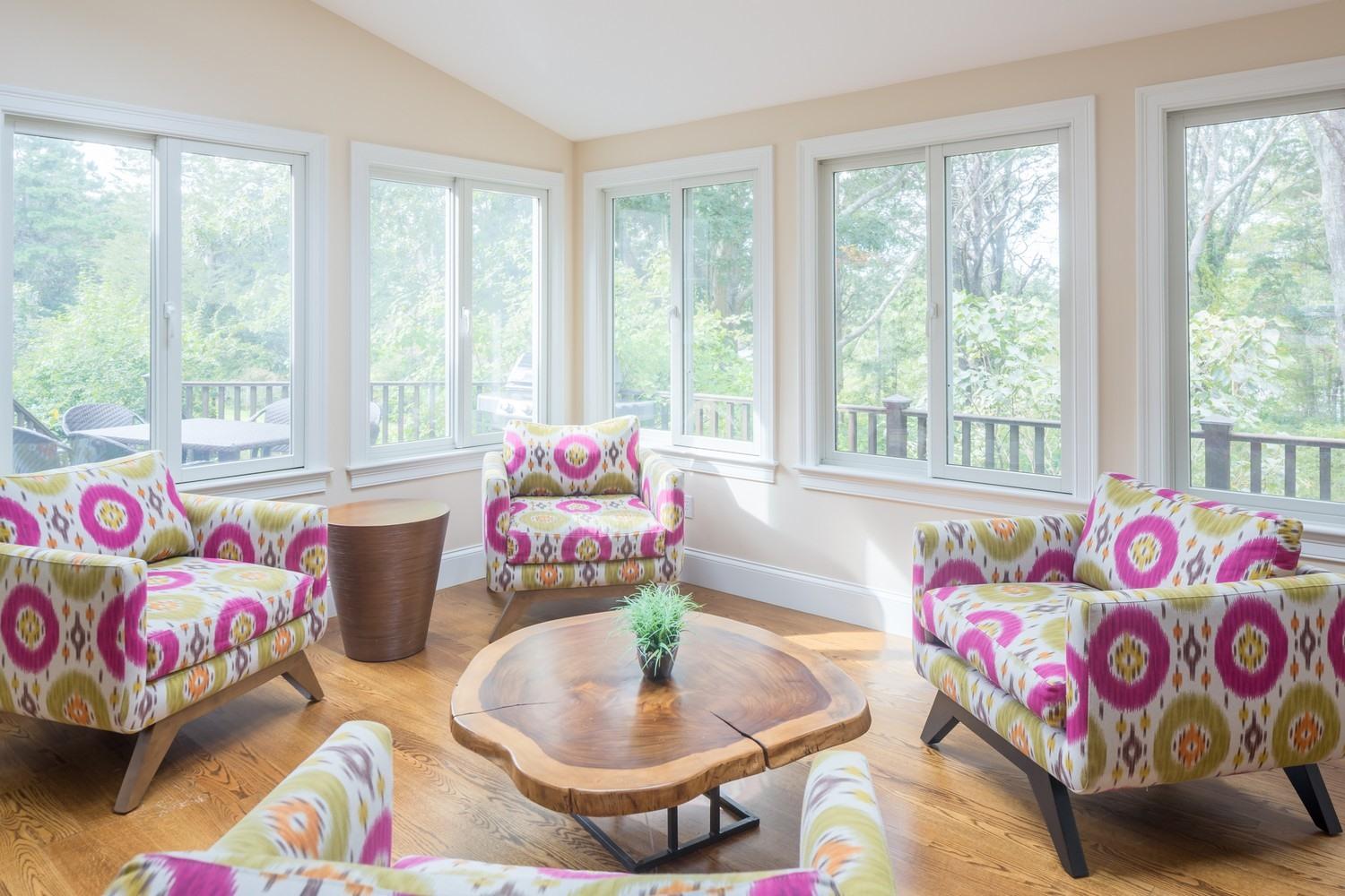 721 Samoset Road Eastham, MA 02642 - Photo 32 of 32 a bedroom with a bed and a couch