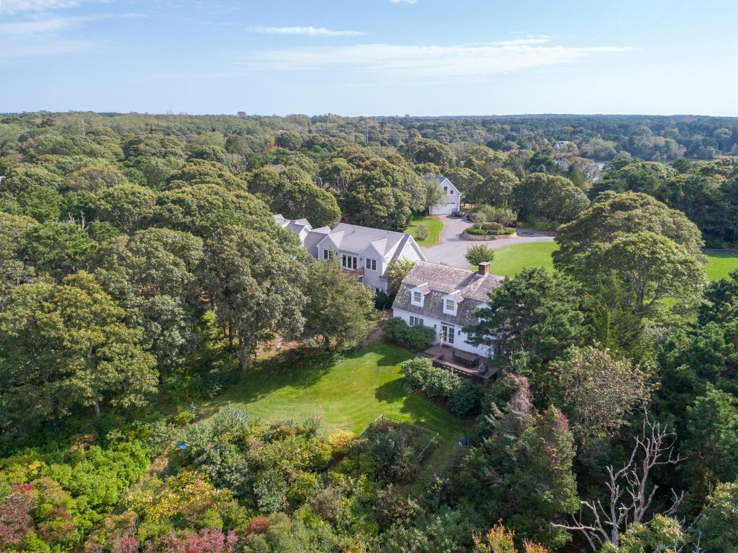 721 Samoset Road Eastham, MA 02642 - Photo 7 of 32 an aerial view of residential houses with outdoor space and trees