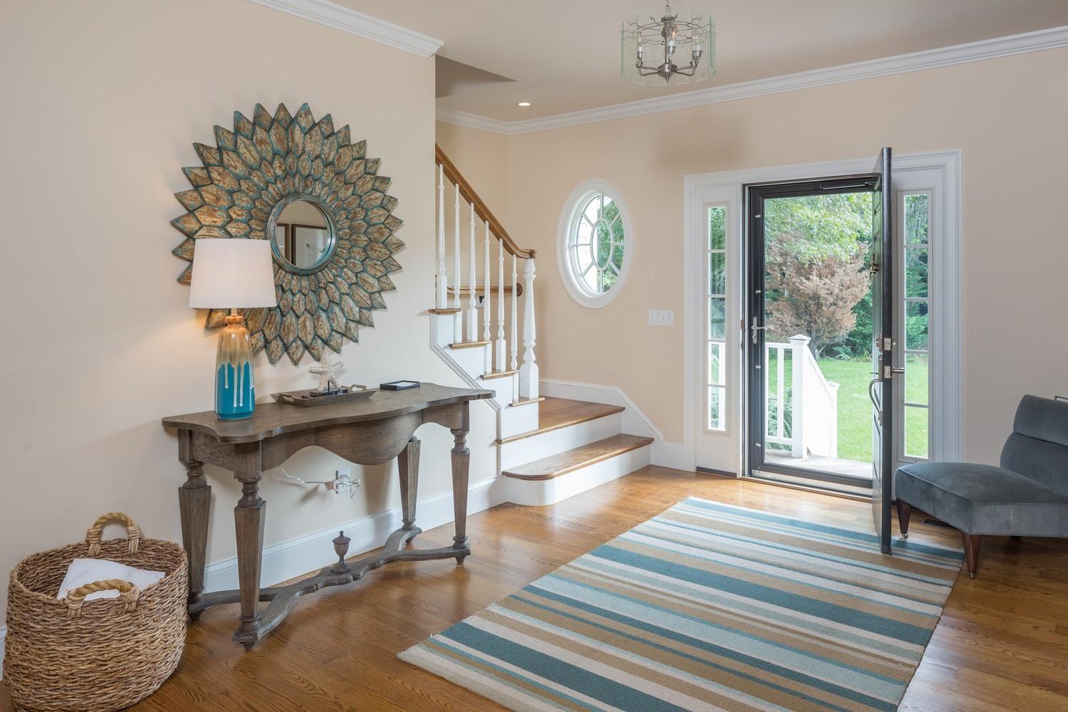 721 Samoset Road Eastham, MA 02642 - Photo 8 of 32 a view of entryway and hall with wooden floor
