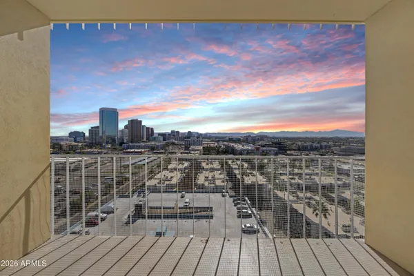 a view of roof deck with patio
