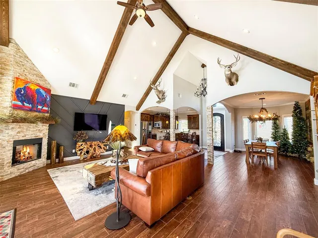 a dining room with furniture and window
