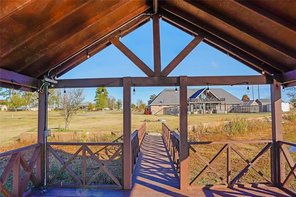 a view of swimming pool from a balcony