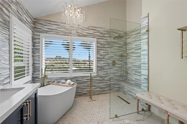 a view of a house with backyard sitting area and garden