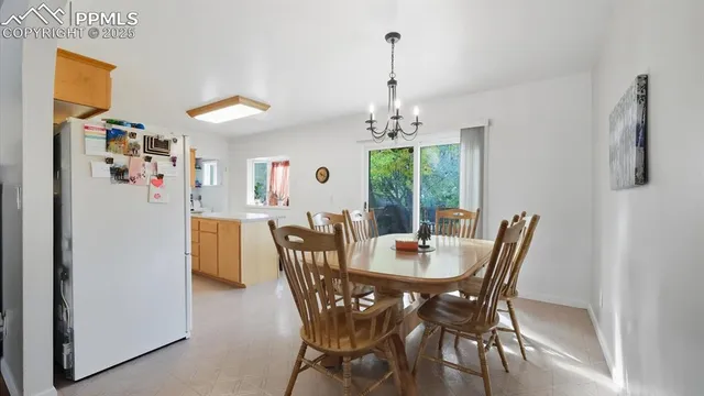 a white refrigerator freezer sitting inside of a kitchen