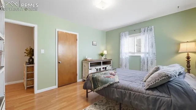 a utility room with a sink a toilet and shower