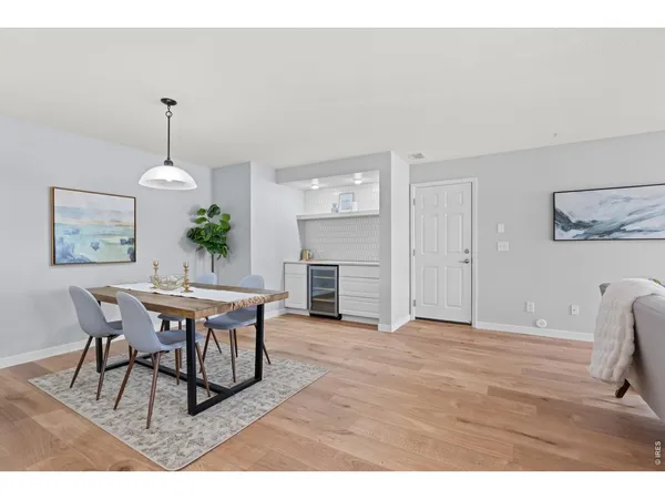 a kitchen with stainless steel appliances a refrigerator sink and cabinets