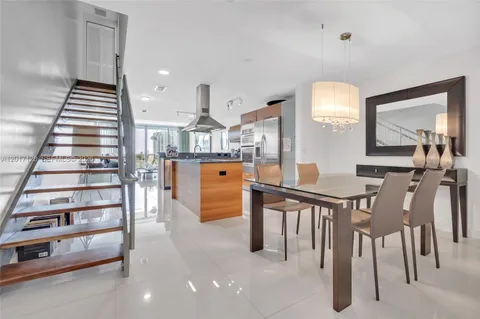 a view of kitchen with breakfast area