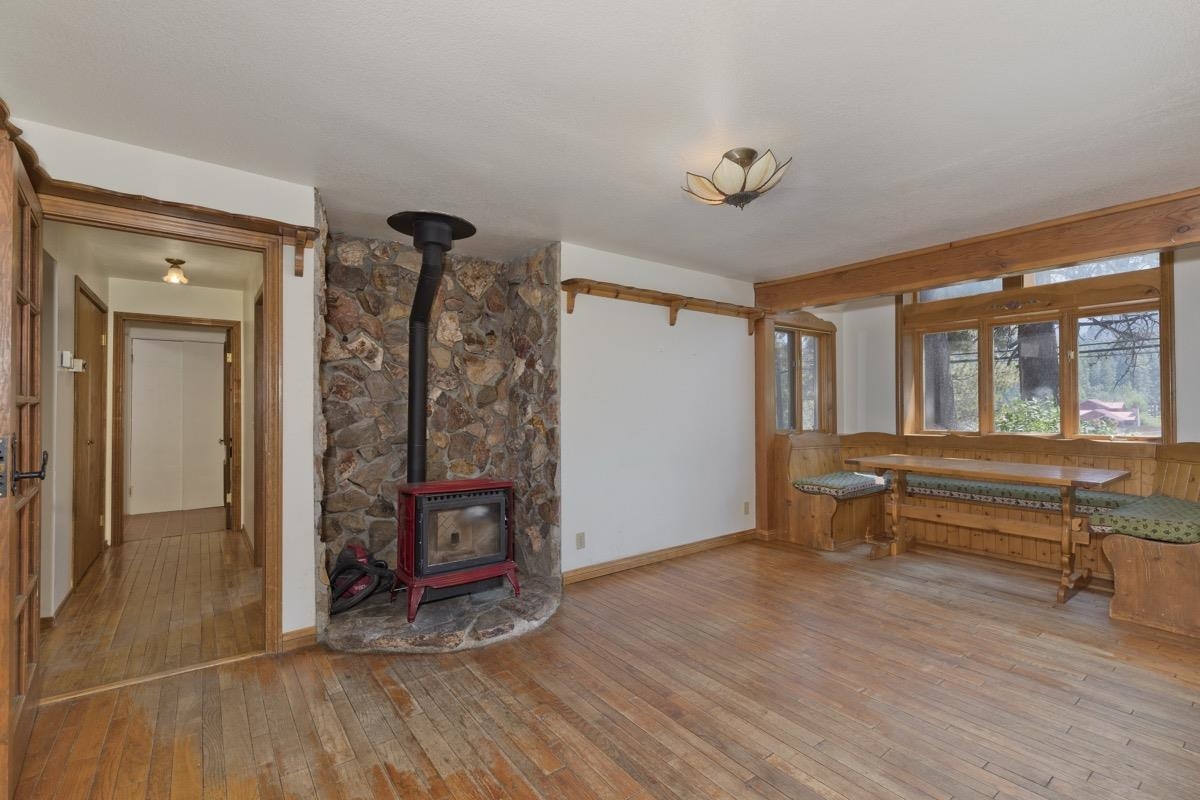 2030 Old Mammoth Road Mammoth Lakes, CA 93546 - Photo 14 of 46 a view of an empty room with window wooden floor and closet area