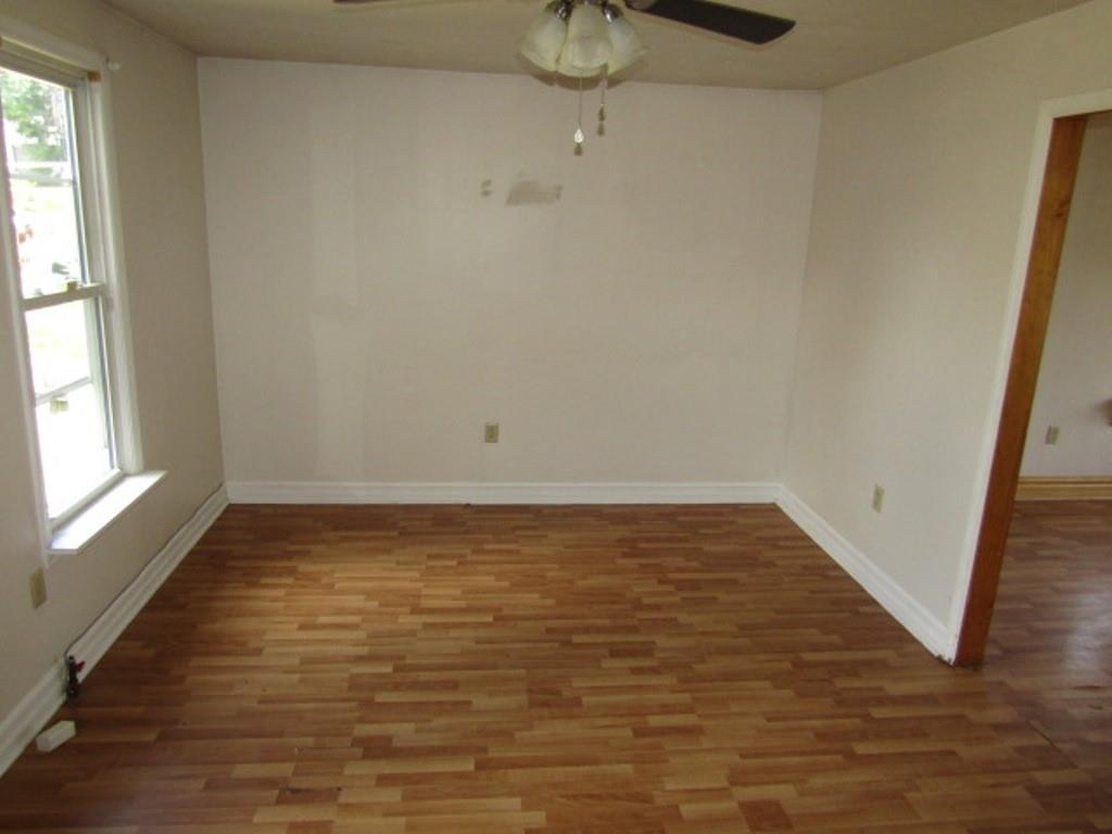255 Duncan Avenue Washington, PA 15301 - Photo 11 of 39 a view of an empty room with wooden floor and windows