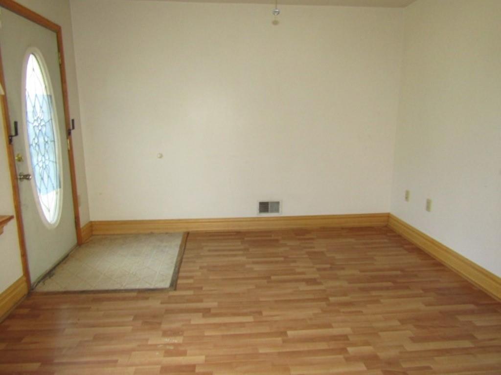 255 Duncan Avenue Washington, PA 15301 - Photo 15 of 39 a view of empty room with wooden floor and fan