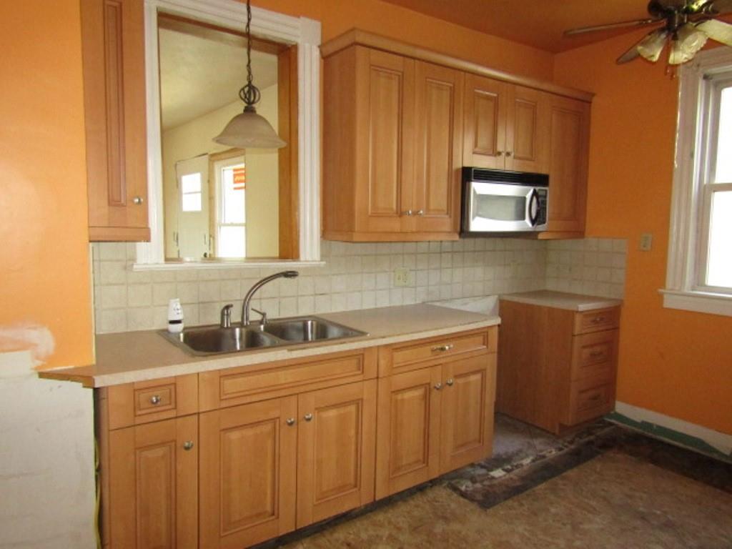 255 Duncan Avenue Washington, PA 15301 - Photo 16 of 39 a kitchen with sink cabinets and window