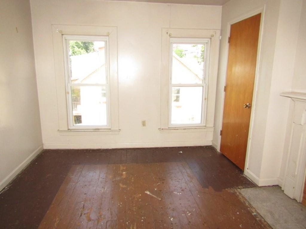 255 Duncan Avenue Washington, PA 15301 - Photo 37 of 39 an empty room with wooden floor and windows