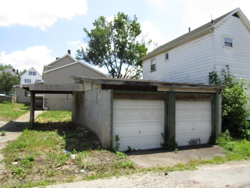255 Duncan Avenue Washington, PA 15301 - Photo 5 of 39 a front view of a house with garden