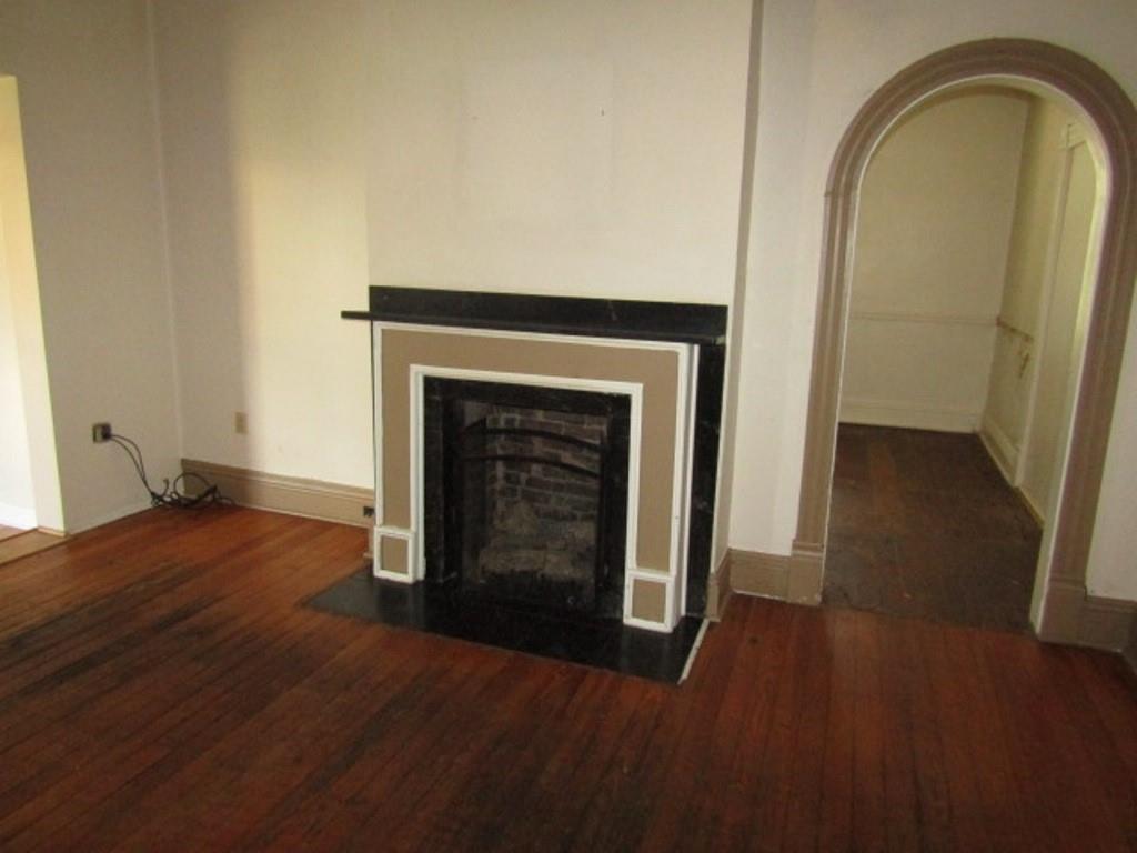 255 Duncan Avenue Washington, PA 15301 - Photo 7 of 39 a view of empty room with wooden floor and fireplace