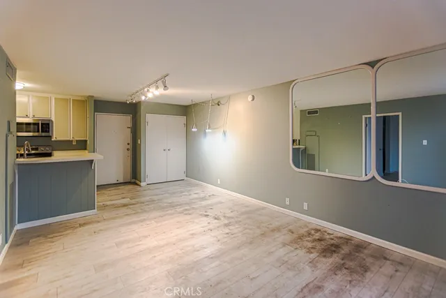 a view of a kitchen with a sink